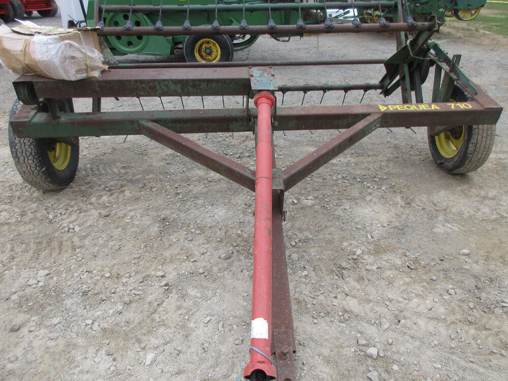 Used Pequea 710 fluffer tedder with PTO drive, all new teeth, some extra used teeth included, air tires, and serial #4558.