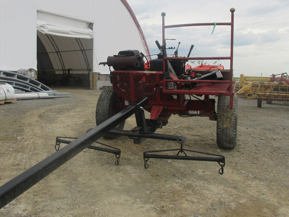 Used Pioneer PTO cart with 27 hp Kohler gas engine, air tires, raised tongue, serial #0302, and in excellent condition. Hour meter shows 375 hours but unit has approximately 1,500 hours.