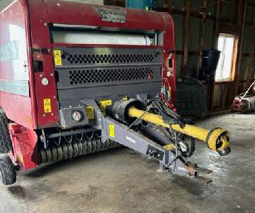 Used Pioneer 4400 (Maschio) round baler with 4x4 bale size, extra-wide 79" pickup, Super Pack for faster feed, net wrap tying, automated oiler, wide flotation tires, approximately 1,000 bales, excellent condition, and serial #KRC2BO243.
