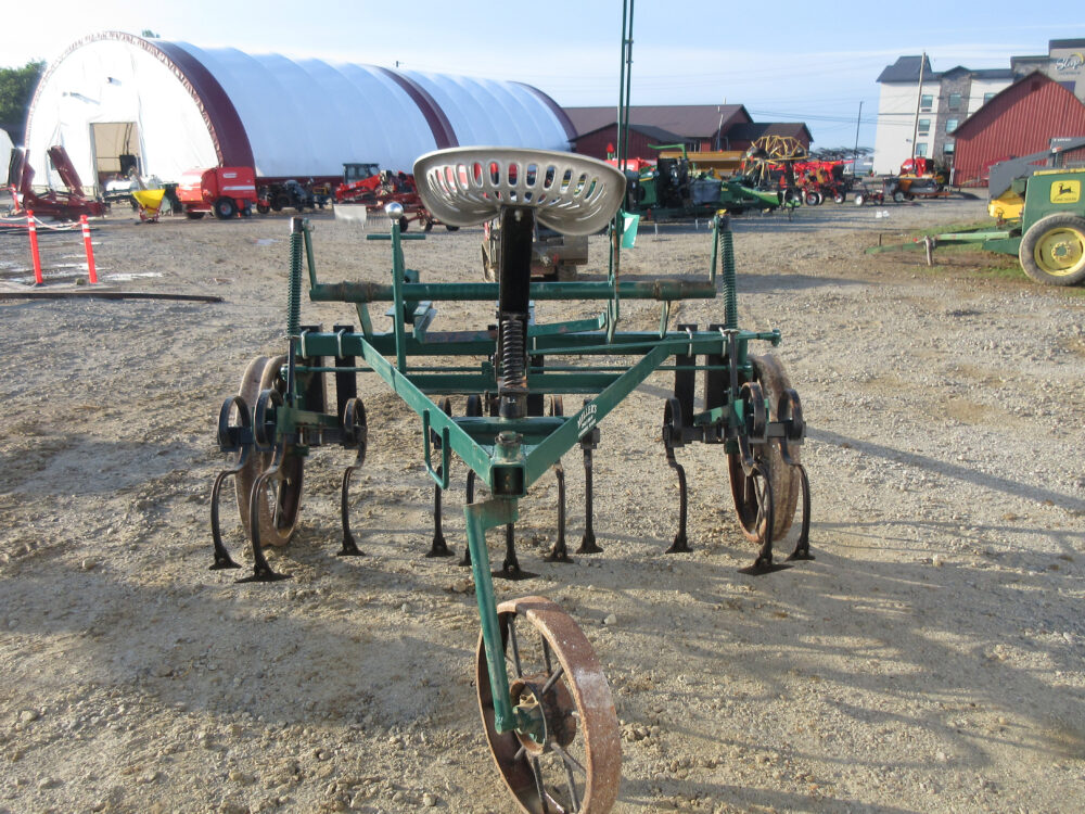 Used equipment: Miller 2-row cultivator with steel wheels, in good condition.