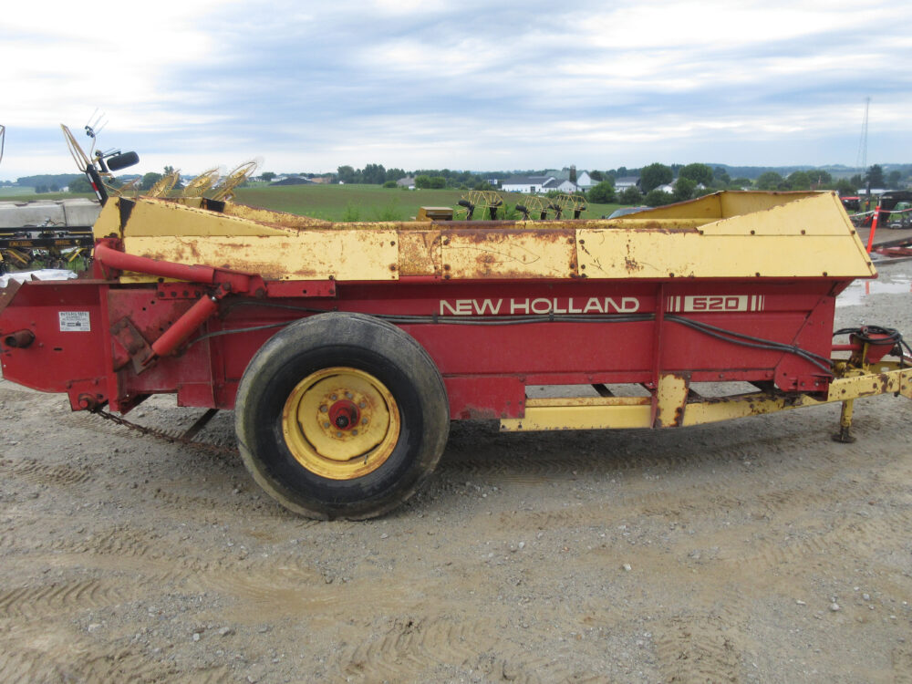 Used equipment: New Holland 520 manure spreader, approximately 100-bushel capacity, PTO drive, single beater, slop gate, in excellent condition, serial number 735214.