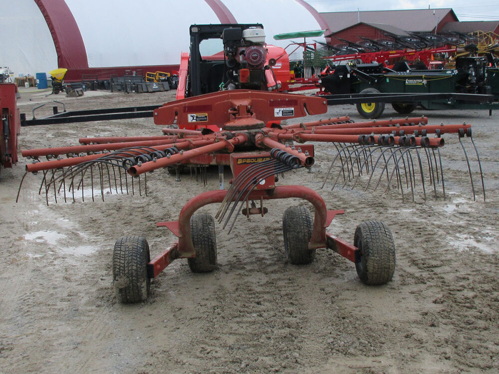 Used equipment: Pequea HR1140 rotary rake with engine, serial number 84048.