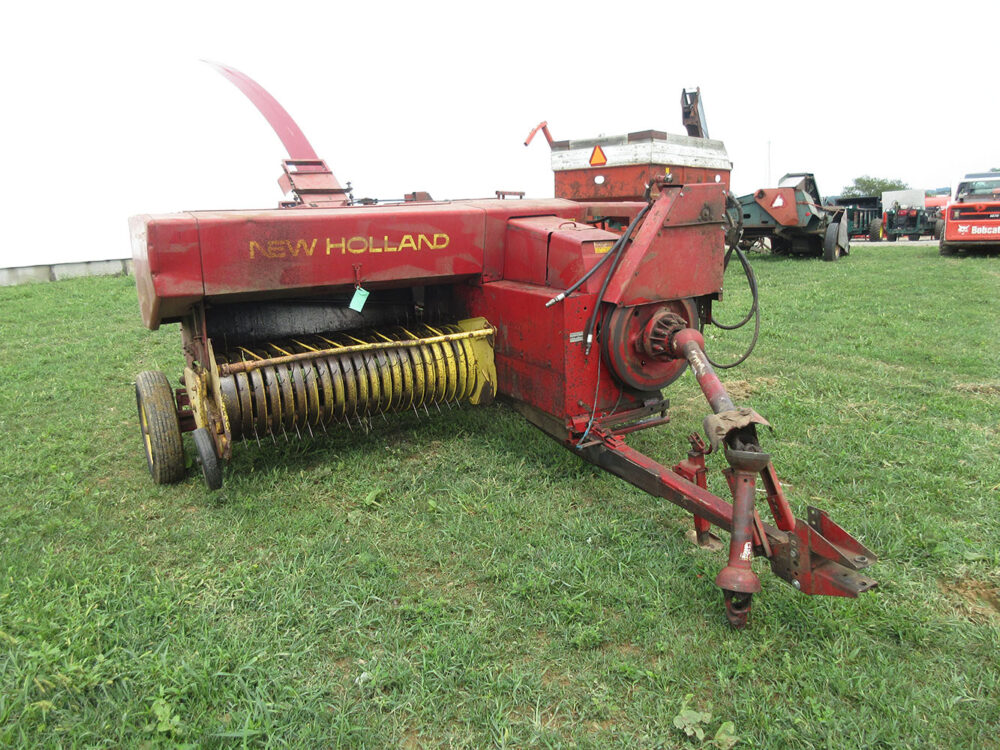 Used New Holland 276 Hayliner baler with thrower, rebuilt knotters, field ready, good condition, hydraulic hoses are worn but do not leak, has multiple broken tines, and serial #318835.