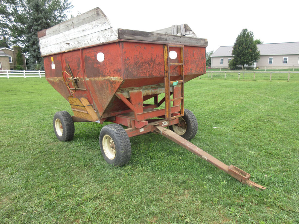 Used Kory 6872 gravity wagon, good condition, SN 763775, extended sides, extendable tongue, painted with a slippery substance to enhance flow.
