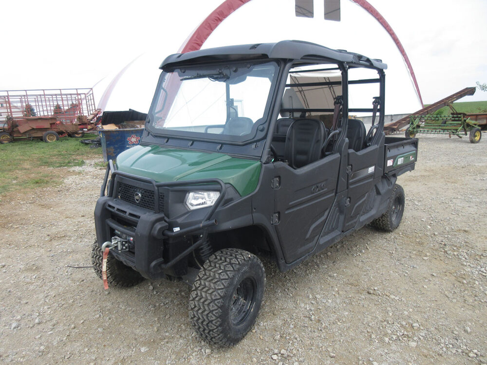 Used Kioti K9 UTV with 300hrs, serial #WYL100004, 2020 model year, 2-row seating, dumping bed, 3000lbs front winch, and good oils. Windshield is cracked and front grille is broken.