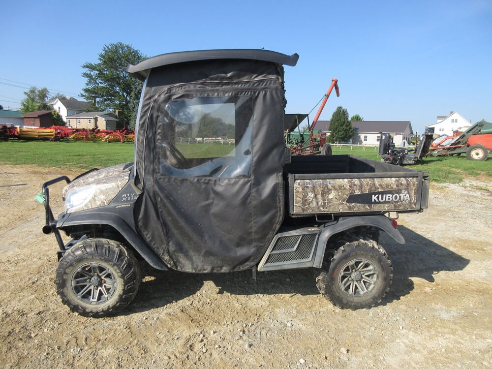 Used equipment: Kubota diesel UTV with enclosure kit, straight exhaust pipe, and approximately 6,500 miles