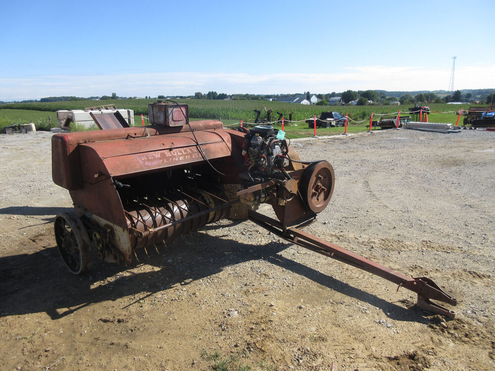 Used equipment: New Holland 68 Hayliner baler with an 18 HP Vanguard engine, in poor condition, with steel wheels (one with rubber), a few bent bands, and no jack