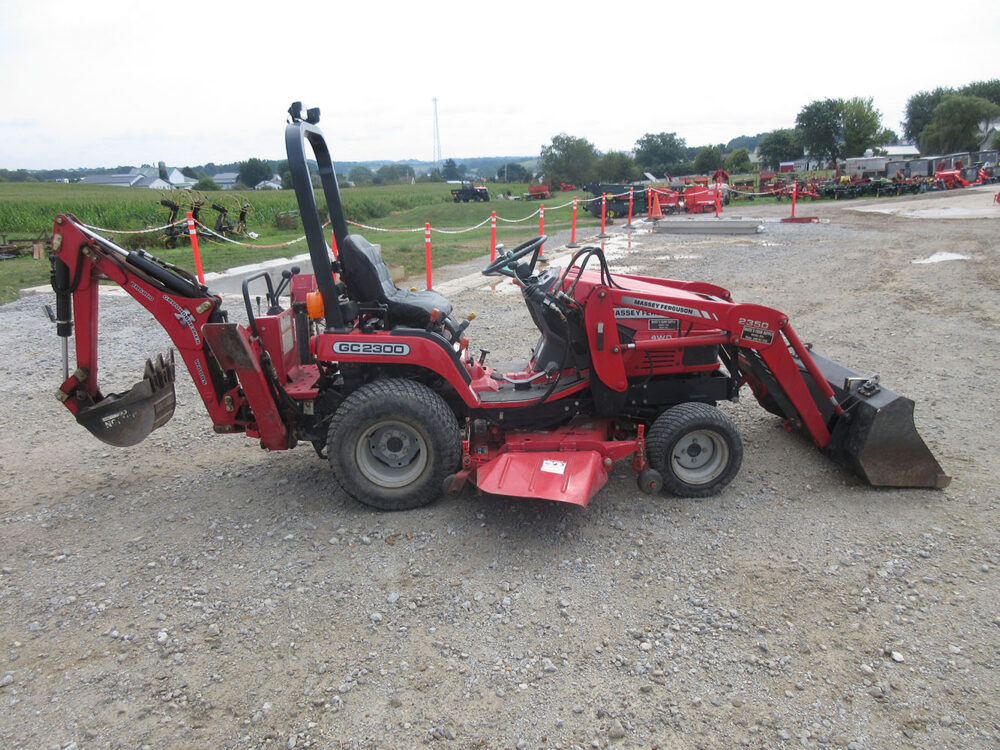 Used Massey GC2300 tractor with serial #T2743, 4wd, loader, backhoe, belly mower, turf tires, 3-point arms included when backhoe is removed, and in excellent condition.