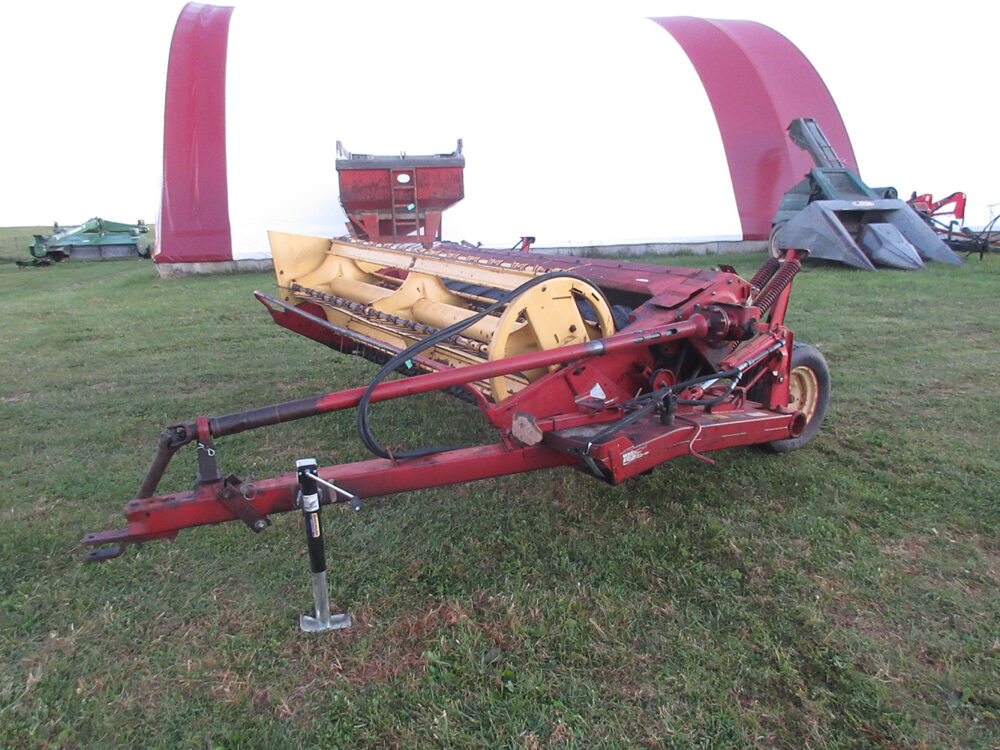 Used equipment: New Holland 488 haybine with 9' cut, stub guards, rolls in good condition, all new blades installed during the last cutting with 10 acres or less since, some teeth are bent or missing, gearbox has a small leak, includes stabilizer bracket, in fair overall condition, last used in fall 2026