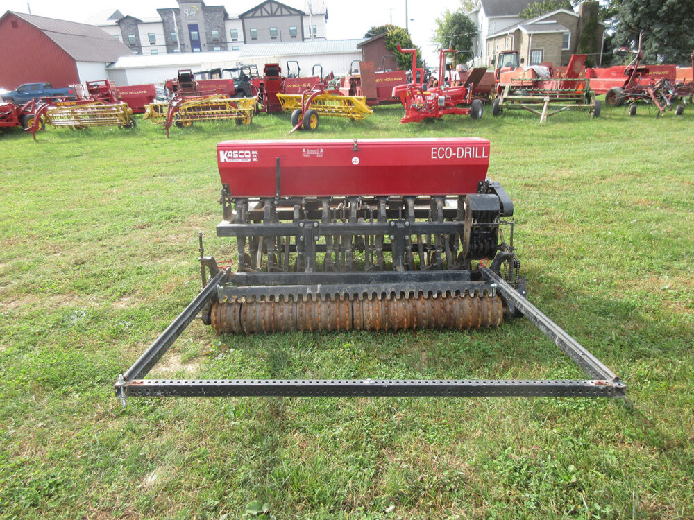 Used equipment: Kasco KED-72 no-till drill with a 72" working width, single-disc openers, small seed box, and packer wheels; used and sold as-is, serial number 1414