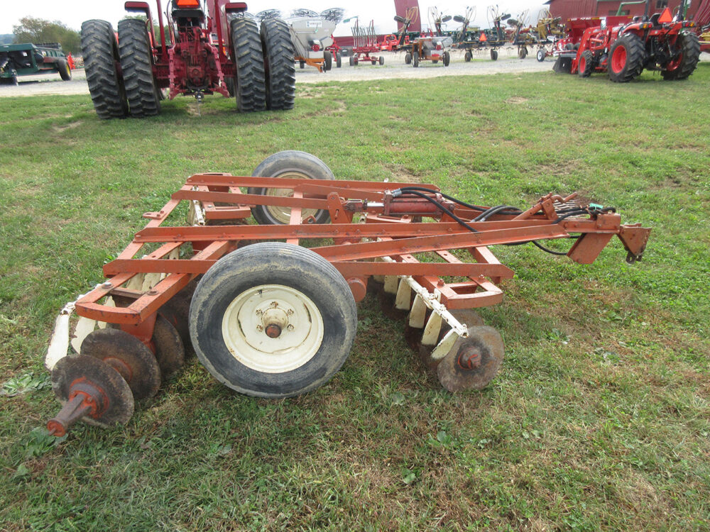 Used equipment: Case SA transport disc, 8' working width, hydraulic lift, scrapers, air tires, a few broken discs, in fair condition, used and sold as-is